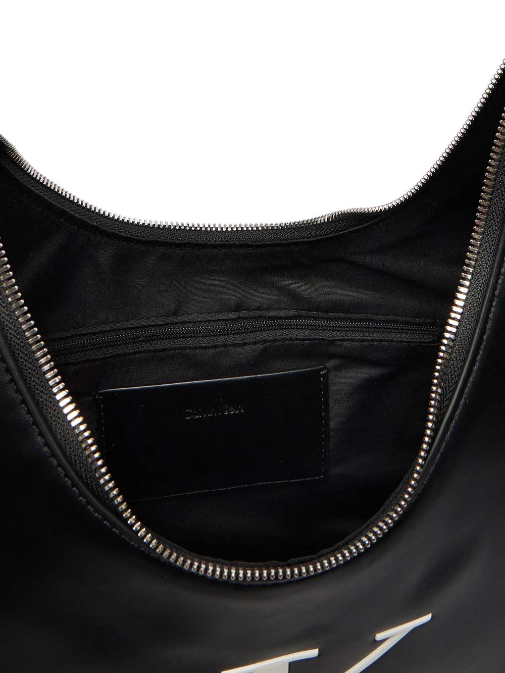 תיק קלווין קליין Bold Crescent Bag נשים